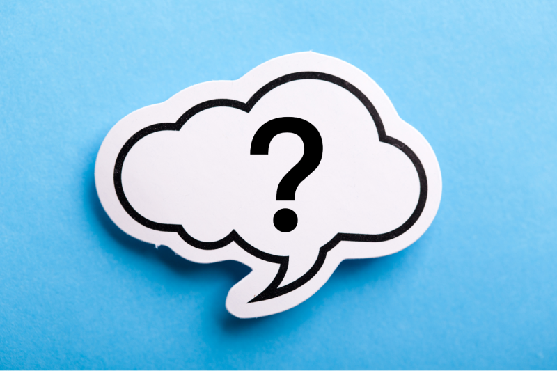 a question mark in a speech bubble against a blue background
